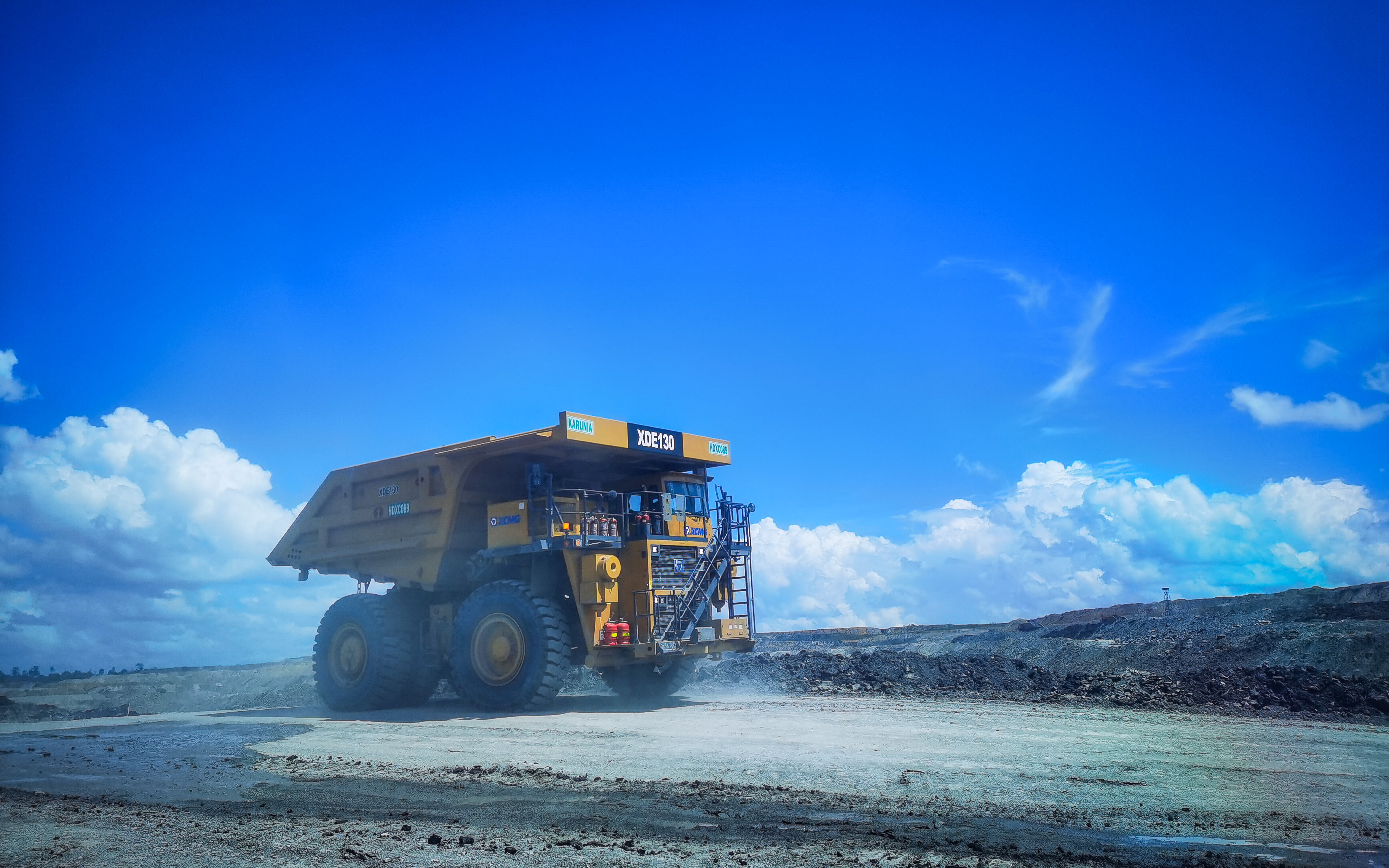 闪灼东南亚！！！九洲国际XDE130双桥刚性矿车效能非凡