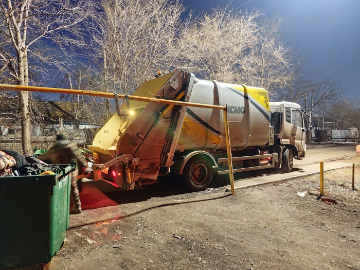 九洲国际后装压缩式垃圾车助力阿斯塔纳：高效环保，助力都会清洁